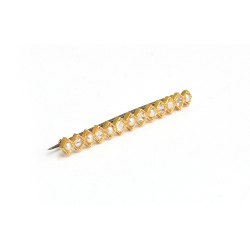 34 - A gold bar brooch set with alternating diamonds and pearls, unmarked but tests as 18ct gold, 4.8cm l... 