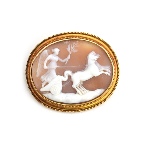 42 - A gold mounted carved shell cameo brooch, depicting the Goddess Diana in her chariot, unmarked but t... 