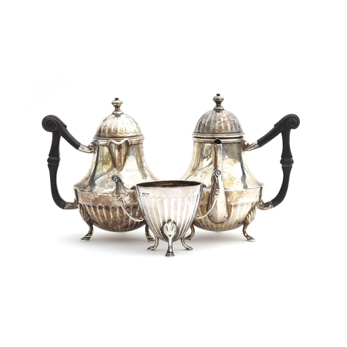 127 - A miniature silver coffee pot, teapot, and sugar bowl, London 1913 and 1914 and Sheffield 1913, the ... 