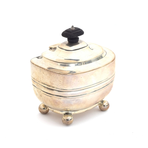 128 - A small Edwardian silver tea canister, London 1901, oblong, with banded body raised on four ball fee... 