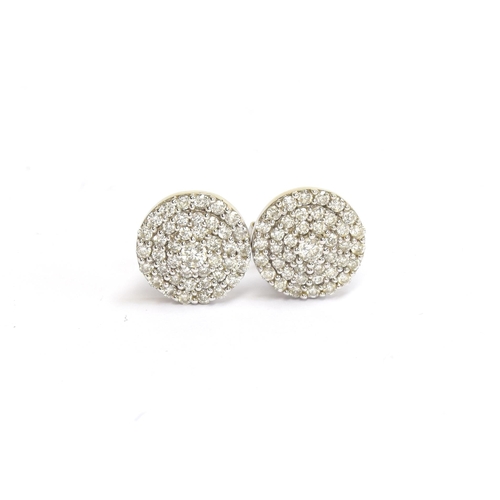 80 - A pair of 14ct white gold diamond cluster stud earrings, each 1.1cm diameter, gross weight 3.1g