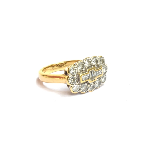 75 - An 18ct gold and diamond cluster ring, the twelve brilliant cut diamonds surrounding a central panel... 