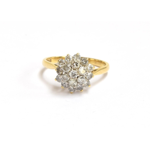 77 - An 18ct gold diamond cluster ring, the diamonds totalling approx. 1ct, size P 1/2, 4.3g