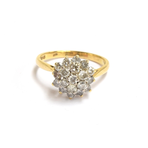 77 - An 18ct gold diamond cluster ring, the diamonds totalling approx. 1ct, size P 1/2, 4.3g