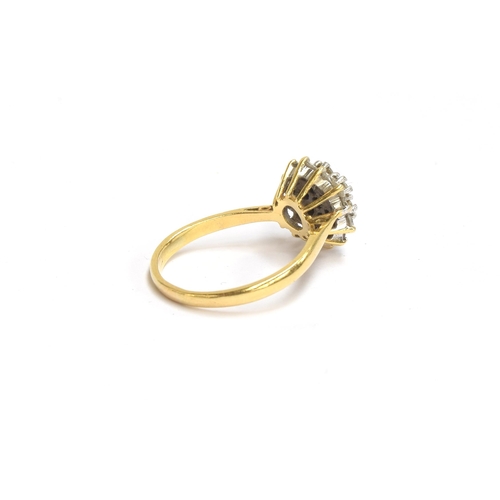 77 - An 18ct gold diamond cluster ring, the diamonds totalling approx. 1ct, size P 1/2, 4.3g