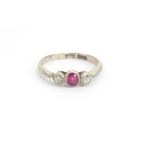 60 - An early 20th century 18ct white gold and platinum ruby and diamond trilogy ring, each set with milg... 