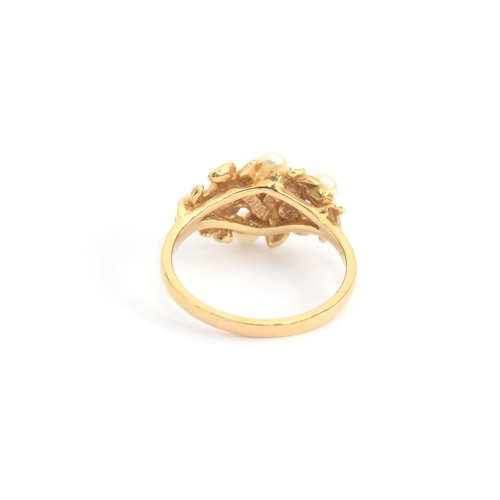 95 - A 14ct gold ring of naturalistic floral form set with pearls, size N, 3.8g