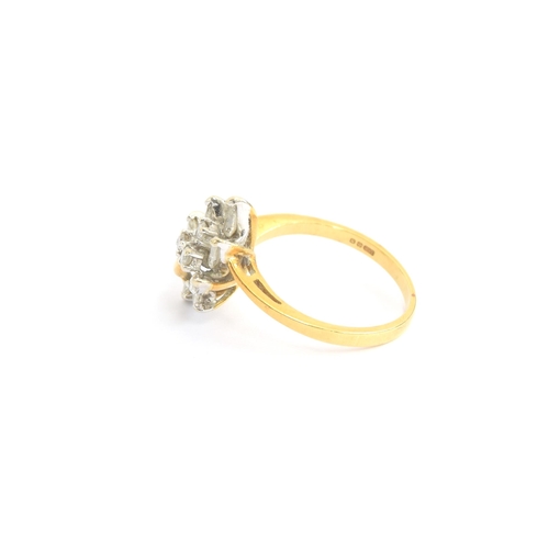 78 - An 18ct gold ring set with a leaf shaped spray of marquise and brilliant cut diamonds, size N, 4.1g