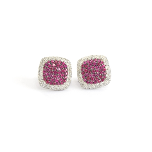 58 - A pair of Effy 14ct white gold earrings pave set with rubies and diamonds, 1.2cm diameter, gross wei... 