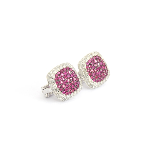 58 - A pair of Effy 14ct white gold earrings pave set with rubies and diamonds, 1.2cm diameter, gross wei... 