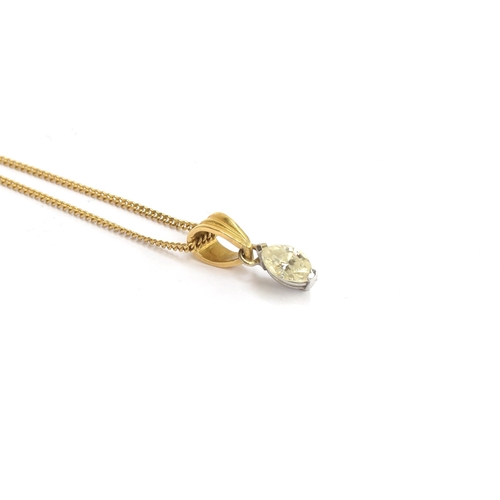 79 - An 18ct gold mounted marquise cut diamond, approx. 0.2cts, on an 18ct gold chain, gross weight 2.8g