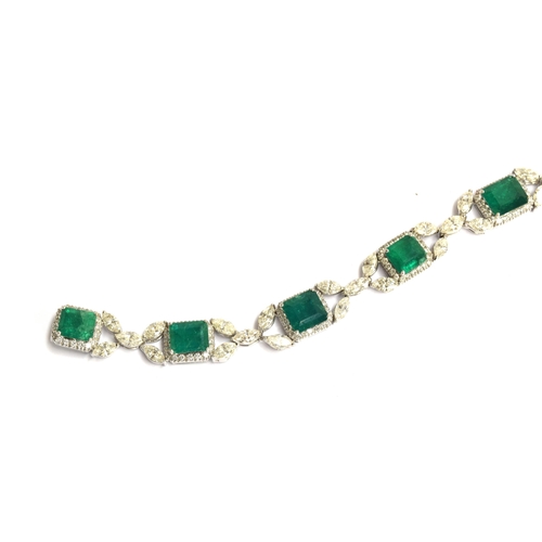 51 - An exquisite 18ct white gold emerald and diamond bracelet, the eight large emeralds approx. a total ... 