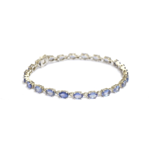 90 - An 18ct white gold tanzanite and diamond bracelet, the total diamond carat approx. 0.44cts, tanzanit... 