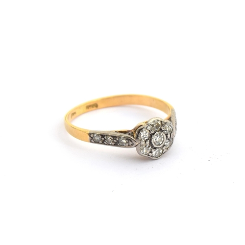 5 - An early 20th century gold and diamond floral cluster ring, marks rubbed but tests as 14ct or higher... 