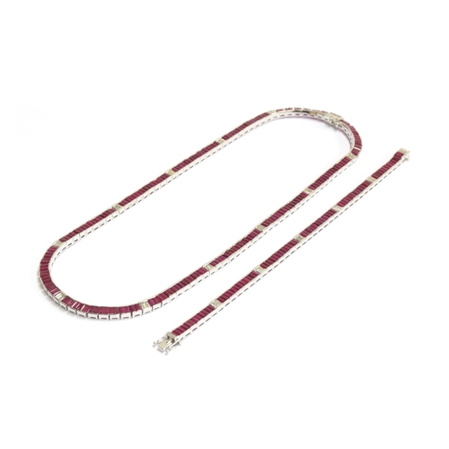 59 - An Art Deco style 14ct white gold ruby and diamond line riviere necklace and tennis bracelet set: th... 