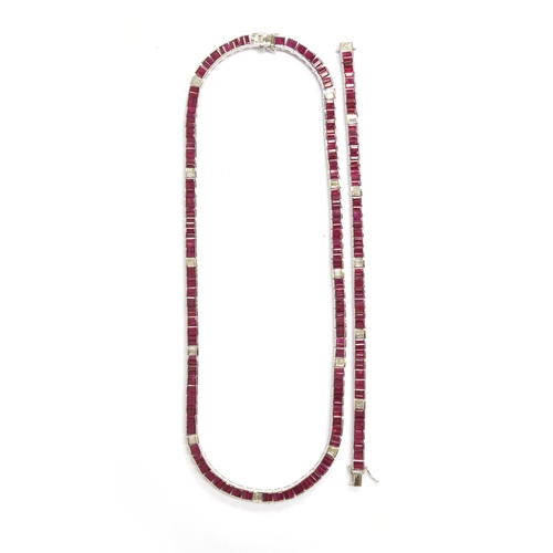 59 - An Art Deco style 14ct white gold ruby and diamond line riviere necklace and tennis bracelet set: th... 