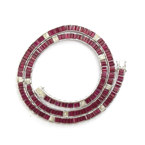 59 - An Art Deco style 14ct white gold ruby and diamond line riviere necklace and tennis bracelet set: th... 