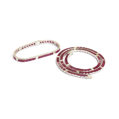 59 - An Art Deco style 14ct white gold ruby and diamond line riviere necklace and tennis bracelet set: th... 