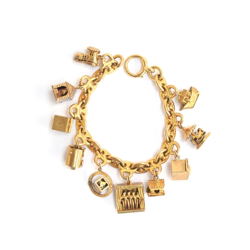 99 - An 18ct gold mariner link charm bracelet with a collection of ten 9ct novelty articulated charms, 17... 