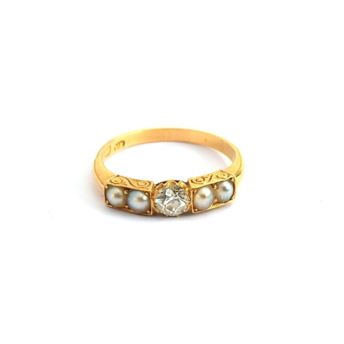 2 - A Victorian 18ct gold ring set with a central old cut diamond flanked by two pearls on each shoulder... 