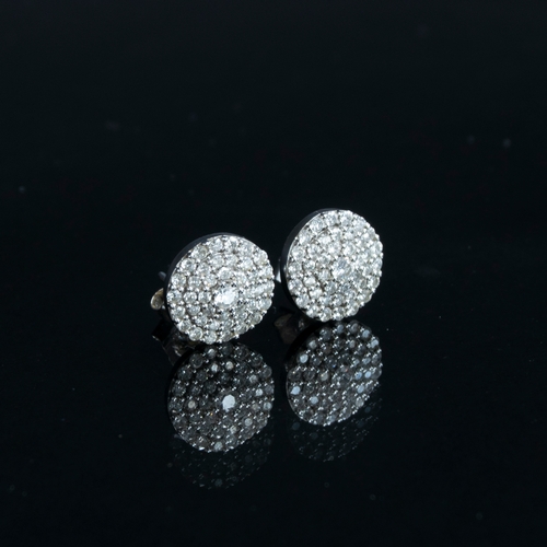 80 - A pair of 14ct white gold diamond cluster stud earrings, each 1.1cm diameter, gross weight 3.1g