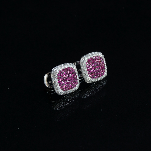 58 - A pair of Effy 14ct white gold earrings pave set with rubies and diamonds, 1.2cm diameter, gross wei... 