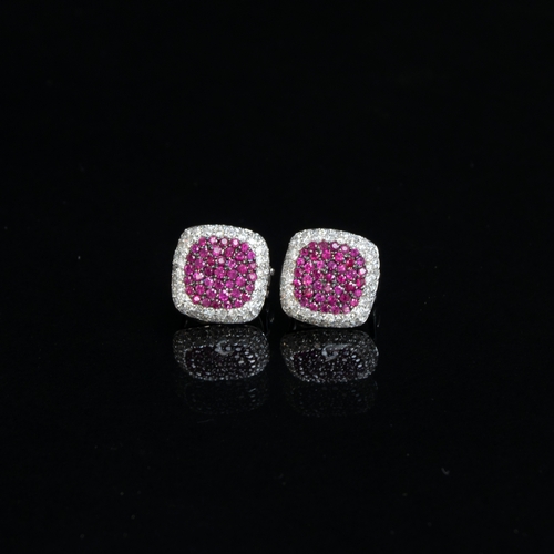 58 - A pair of Effy 14ct white gold earrings pave set with rubies and diamonds, 1.2cm diameter, gross wei... 