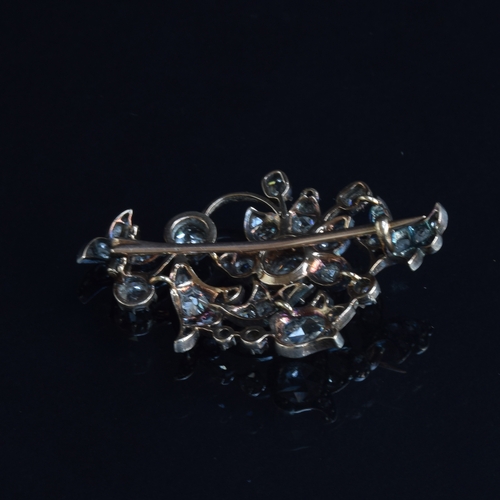 44 - A 19th century diamond brooch, designed as a floral spray, with a variety of diamond cuts including ... 
