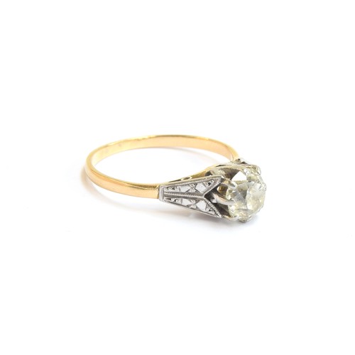 7 - An early 20th century 18ct gold and platinum set diamond solitaire ring, the large old cut diamond a... 
