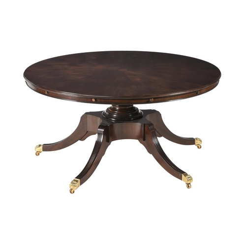 492 - A mahogany concentric extending dining table in Regency style, with four additional elliptical leaf ... 