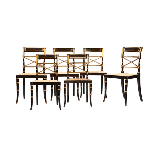 493 - A set of six Regency style simulated rosewood and parcel gilt dining chairs, 19th century, each with... 