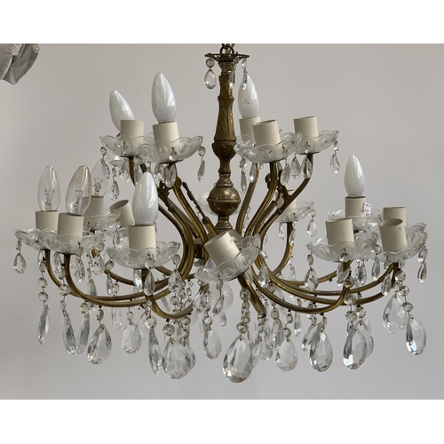 315 - An 18 arm gilt metal and glass chandelier, approx. 64cm wide