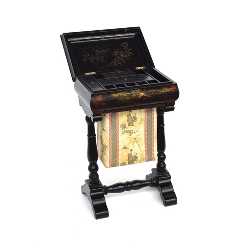 477 - A 19th century black Japanned work table, the hinged lid opening to a fitted interior, with pull out... 