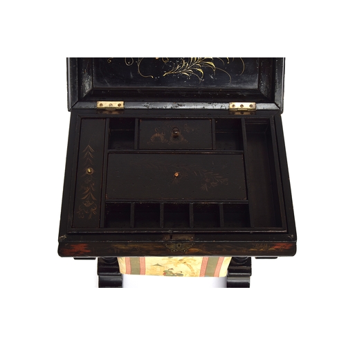 477 - A 19th century black Japanned work table, the hinged lid opening to a fitted interior, with pull out... 