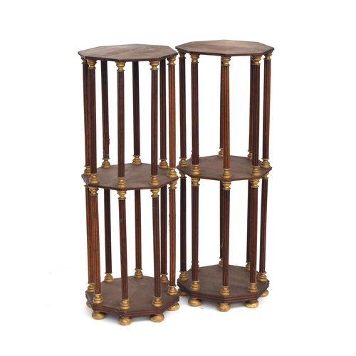 479 - A pair of mahogany and parcel gilt three tier octagonal etageres or plant stands, on reeded supports... 