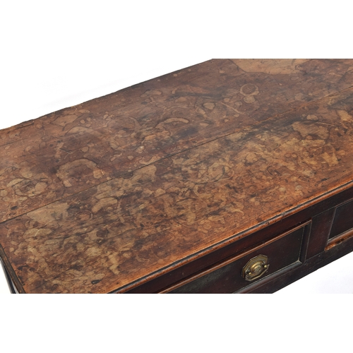 449 - An 18th century mahogany dresser base, the moulded top over three heavily cockbeaded drawers, on squ... 