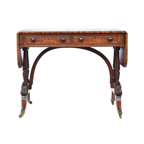 467 - A Regency mahogany sofa table, two frieze drawers with opposing blind drawers, on four turned suppor... 