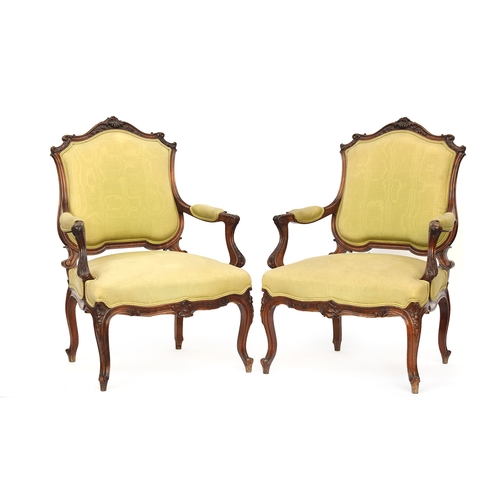 514 - A good pair of Louis XVI style open armchairs, floral carved frame, with moire silk upholstered back... 