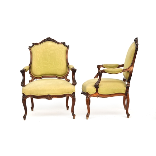 514 - A good pair of Louis XVI style open armchairs, floral carved frame, with moire silk upholstered back... 