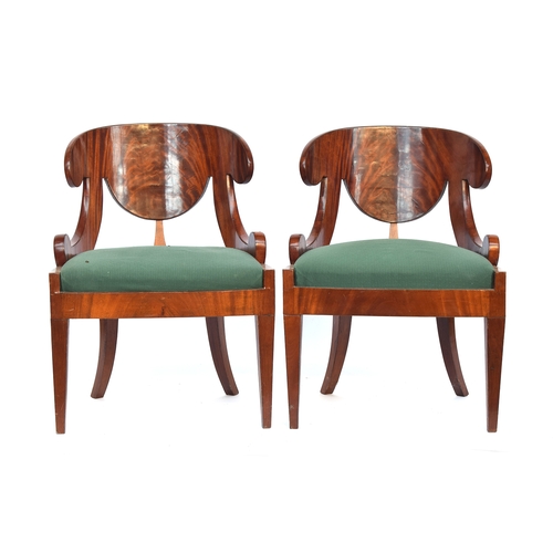 497 - A pair of mahogany Russian Biedermeier klizmos style side chairs, stuffover upholstered seats, 61cm ... 