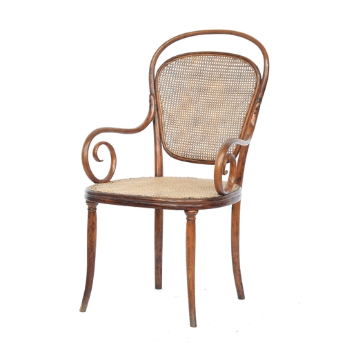 502 - A Gebrüder Thonet bentwood and caned open armchair, bears label to stretcher, 58cm wide, the seat 45... 