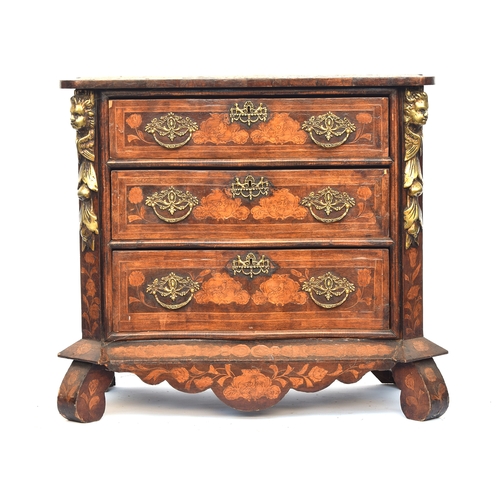 452 - An 18th century and later Dutch serpentine marquetry chest of three drawers, allover floral inlay, t... 