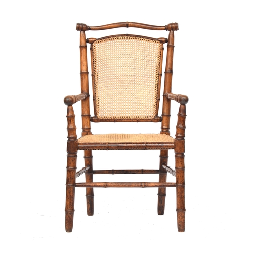 501 - A French 19th century faux bamboo open armchair, c.1880, with caned seat, approx. 59cm wide, the sea... 