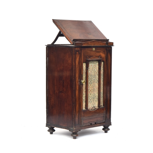 487 - A 19th century lectern or reading stand, hinged top, with cupboard below opening to two shelves, 50c... 