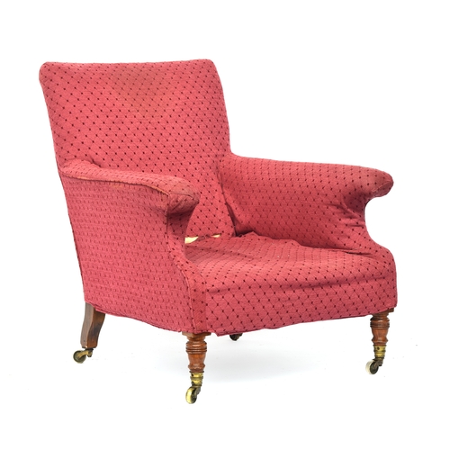 510 - A Victorian armchair, the back leg number stamped, the two back casters marked Howard & Sons, the fr... 