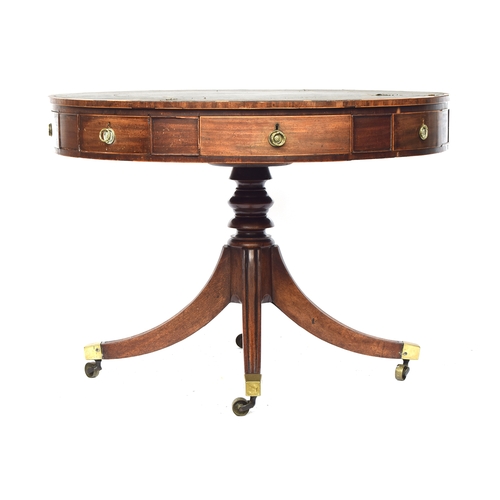 490 - A Regency mahogany drum top library table, the circular top with green leather skiver, four drawers ... 