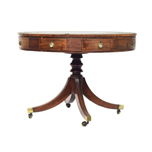 490 - A Regency mahogany drum top library table, the circular top with green leather skiver, four drawers ... 