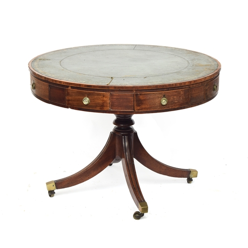 490 - A Regency mahogany drum top library table, the circular top with green leather skiver, four drawers ... 