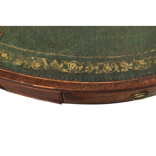 490 - A Regency mahogany drum top library table, the circular top with green leather skiver, four drawers ... 