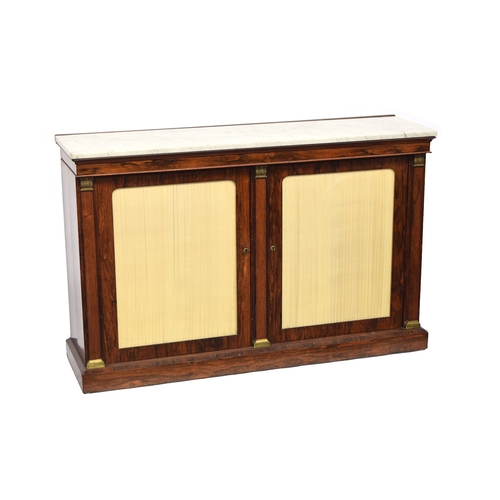 484 - A Regency rosewood and marble topped credenza sideboard, the glazed doors with pleated silk behind, ... 